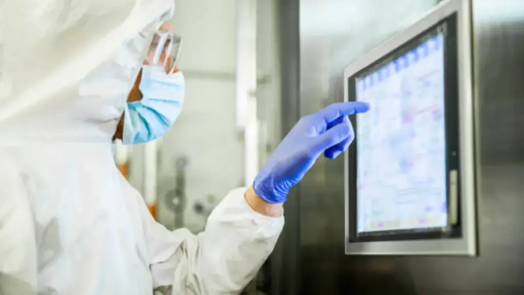 portrait-of-an-engineer-touching-a-screen