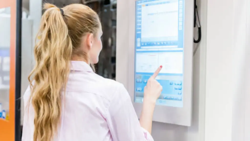 Female Engineer Touch Screen & Industrial Machine
