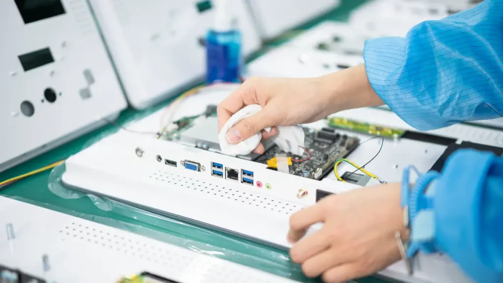 Workers Are Processing The Rear Sockets Of The Industrial PC
