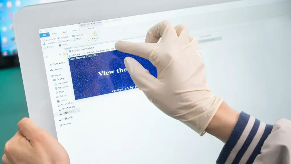 Workers Hold LCD Screens With Working Interfaces And Wear Gloves To Perform Touch Operations On The Screens