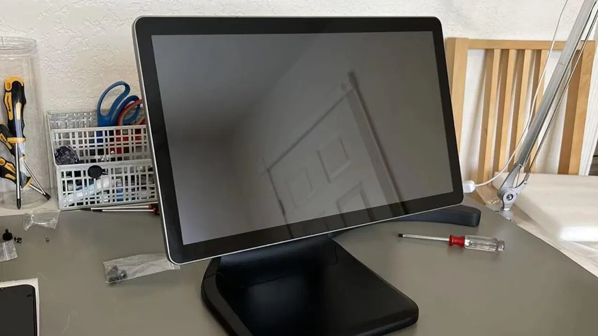 A Desktop POS Touch Monitor Placed On A Worktable