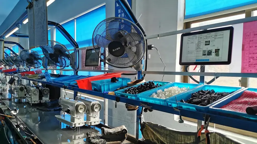 Assembly Line Workstation With Digital Monitor And Components