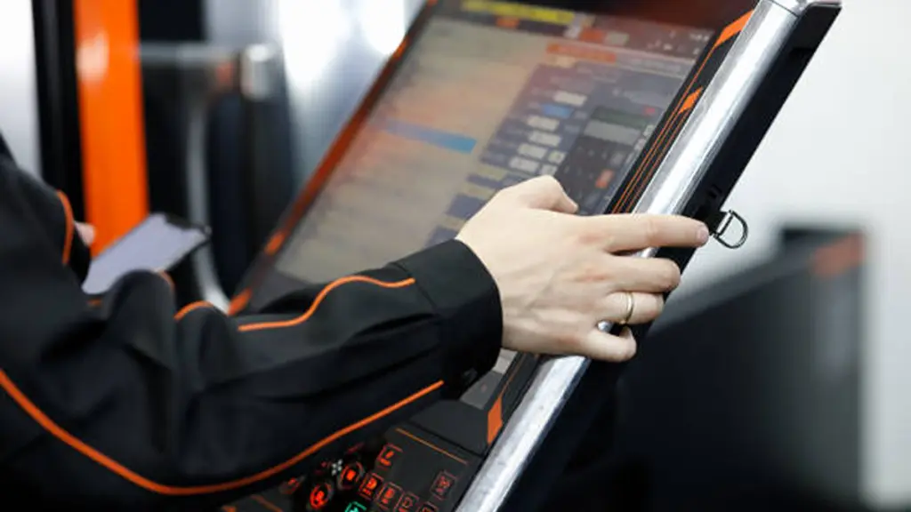 Operator Working With Touch Screen Control Panel