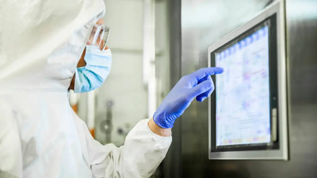 Portrait Of An Engineer Touching A Screen