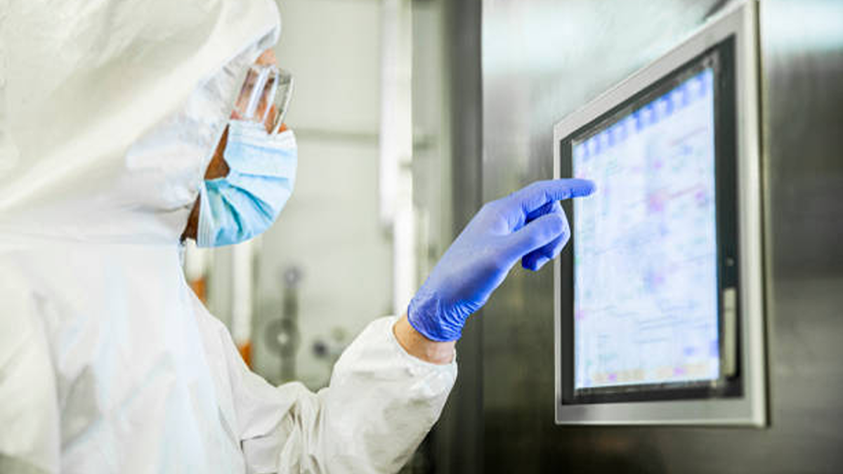 Portrait Of An Engineer Touching A Screen