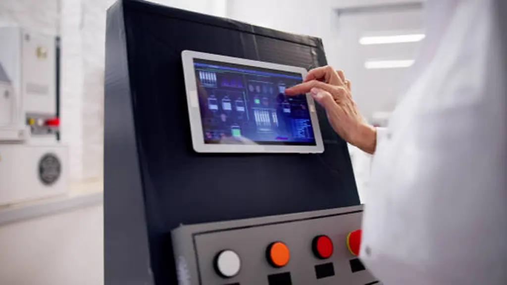 Skilled Operator Using Industrial Touch Screen